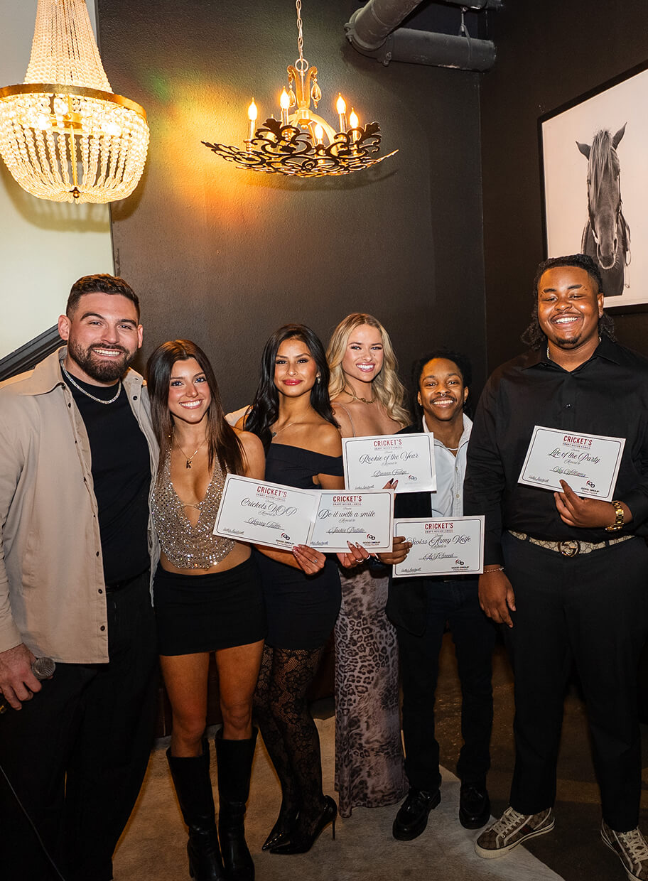 Good Group team members with certificates